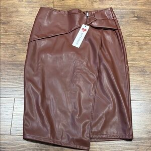Faux leather reddish brown mid length skirt